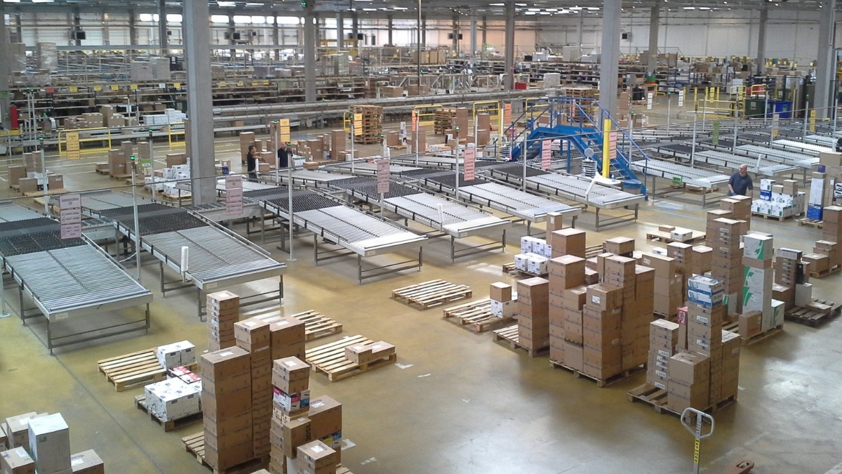 large warehouse interior with conveyor rollers